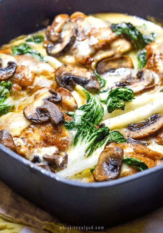 chicken, mushroom, and bok choy in a casserole dish