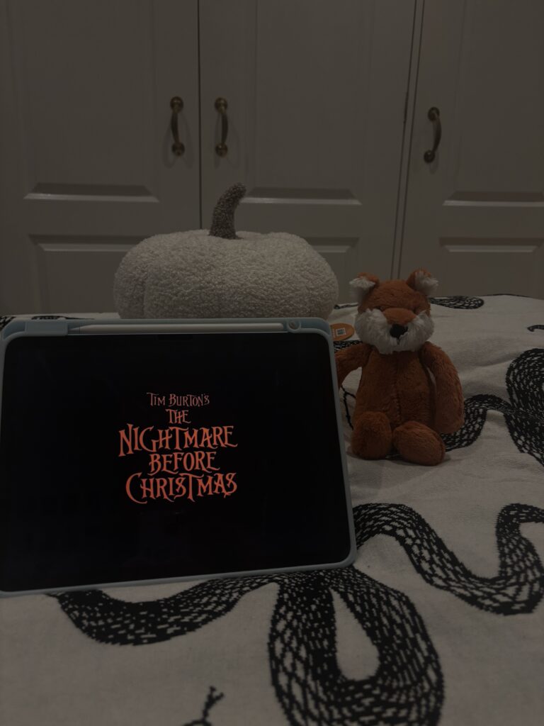 Halloween movie Nightmare before Christmas on an ipad on a bed for a Halloween slumber party